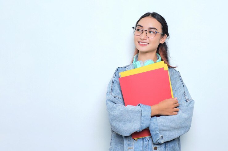 smiling-young-pretty-woman-wearing-backpack-holding-books-isolated-white-background_512242-5308 Les Privat Bahasa Asing